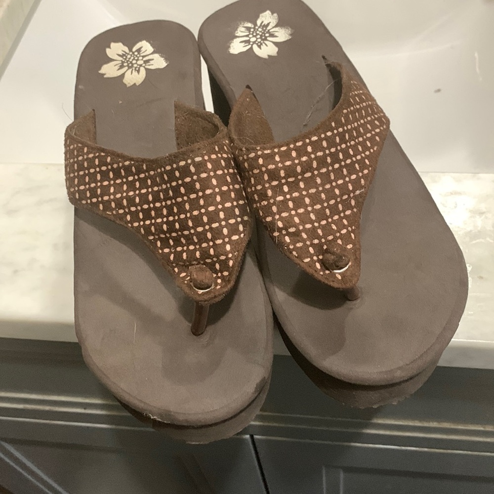 Brown flip flops